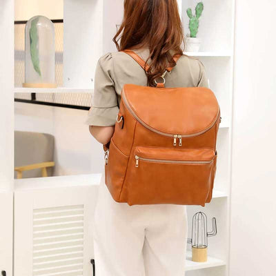 femme sac a langer a dos cuir